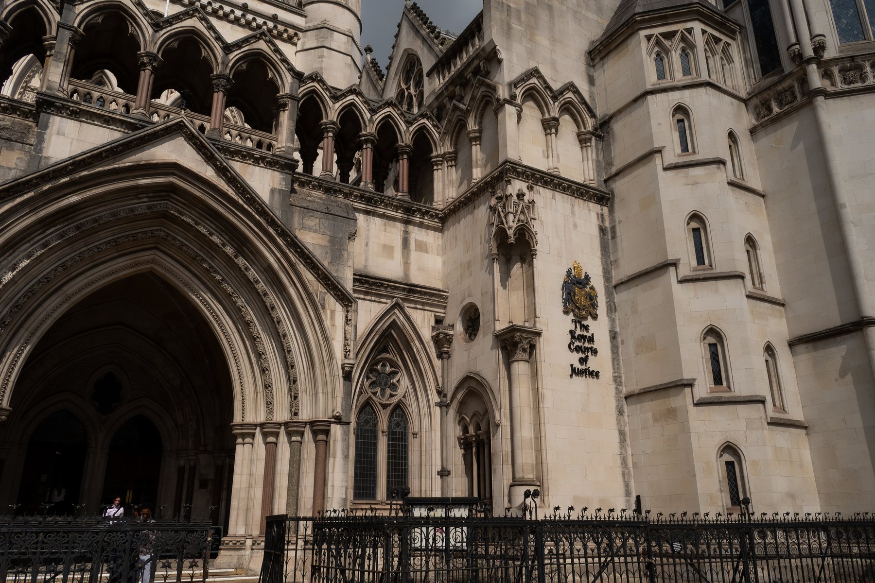 Gothic archway entrance of the Royal Courts of Justice, architecture photography, London