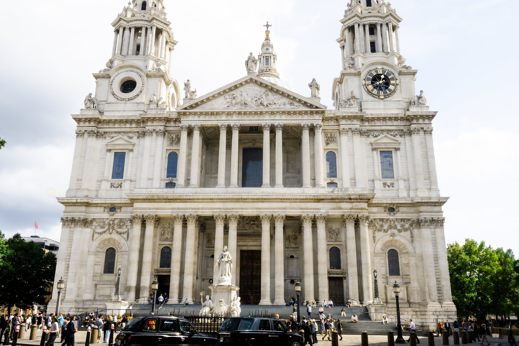 St Paul's Cathedral facade with clock towers, architecture photography, London