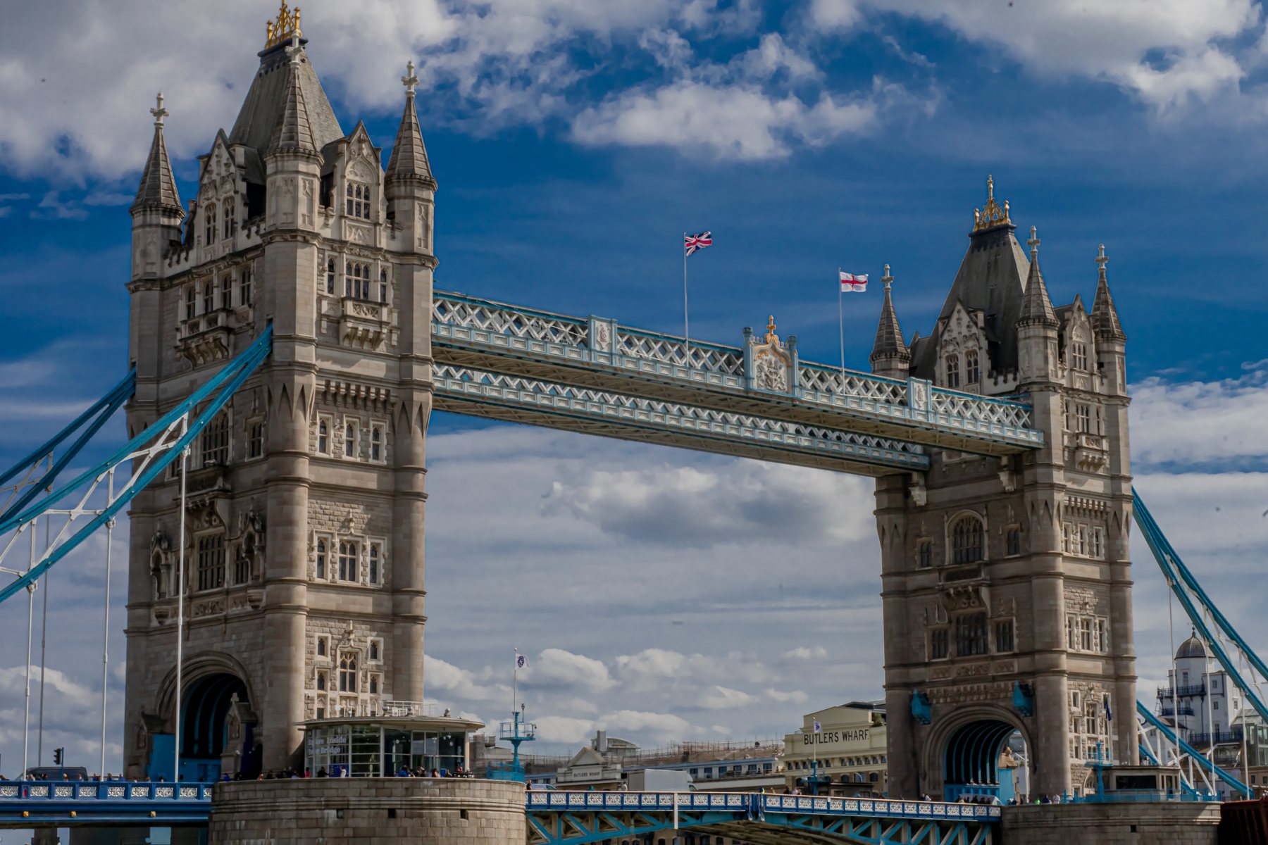 Front view of Tower Bridge with flags flying, architecture photography, London