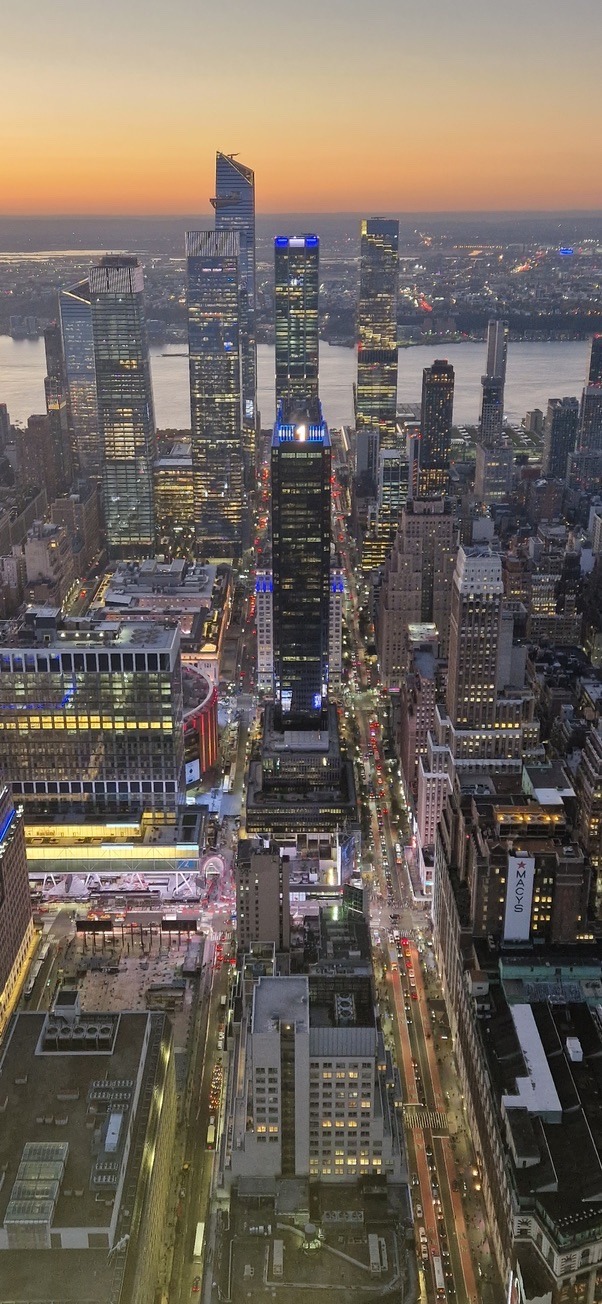 Crowds and illuminated billboards in Times Square, New York street photography