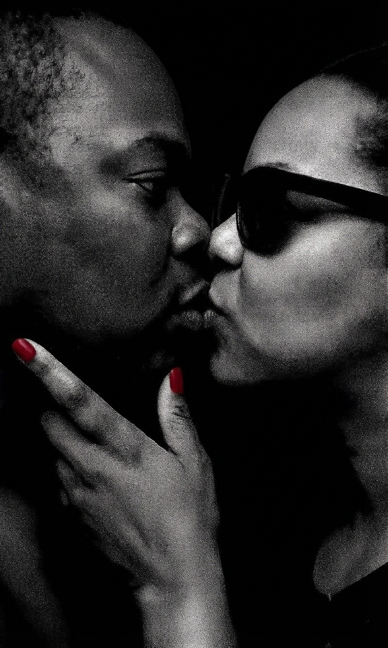Grainy black and white portrait of a couple sharing a close kiss, hand raised near the face, wall art print