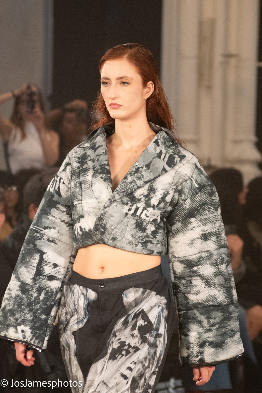 Model in a printed cropped jacket on the catwalk, London Fashion Week 2026
